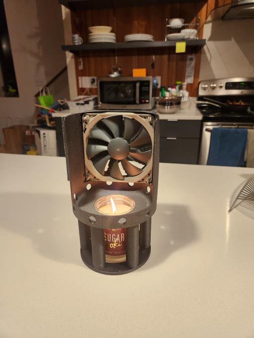 Rear view of the scent sprayer: A 3d printed device for placing a fan over a scented candle.